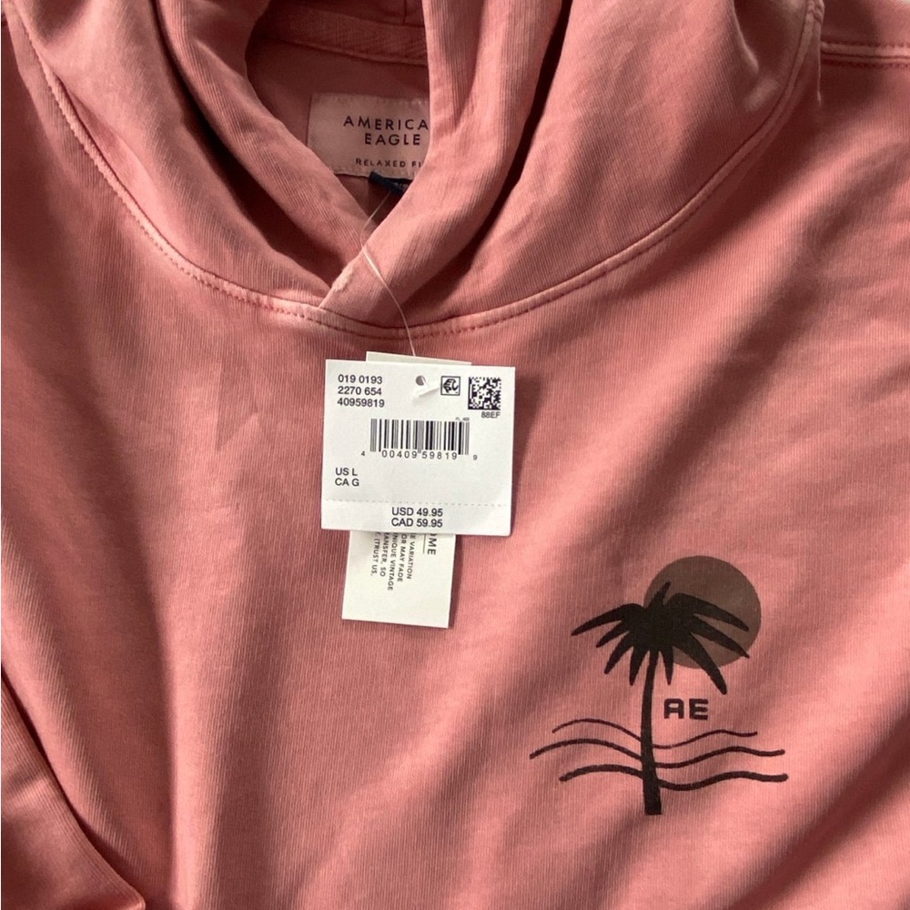 American Eagle Outfitters Pink Hoodie with Black Palm Tree Design